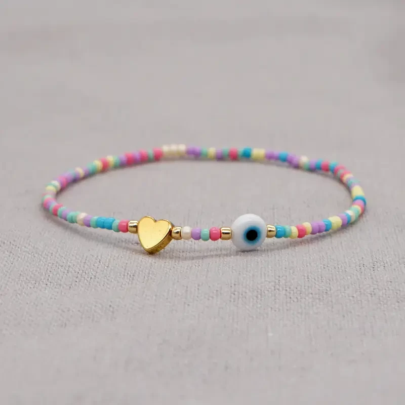 Bohemian Handwoven Glass Bead Bracelet with Heart Charm and Evil Eye Accent, Adjustable Multicolor Strand for Daily Wear and Gift-Giving, No Plating – 1PC