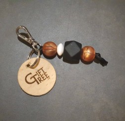 Juguete sensorial con forma de llave de árbol de regalos