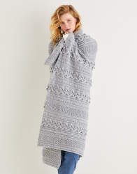 Manta de merino con detalle de pompones | Hecha a mano | Hecha a mano