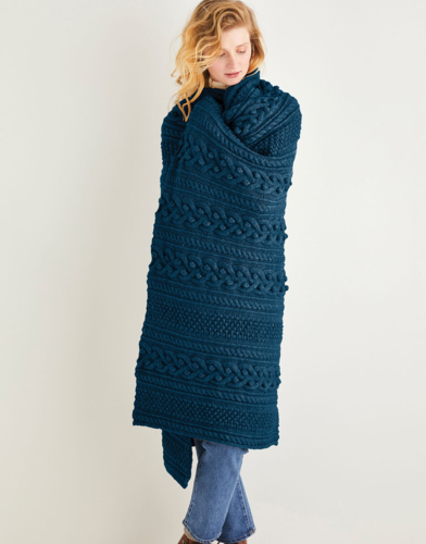 Manta de merino con detalle de pompones | Hecha a mano | Hecha a mano