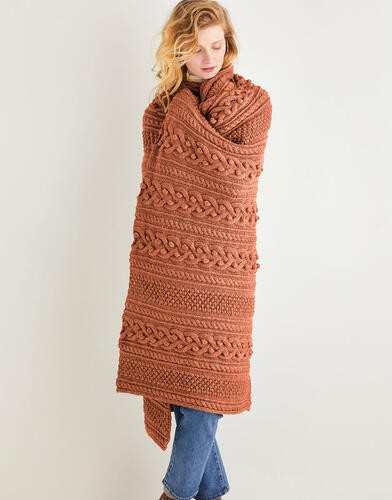 Manta de merino con detalle de pompones | Hecha a mano | Hecha a mano