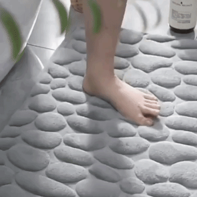Alfombra de baño de adoquines