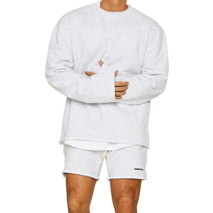 Conjunto de sudadera y pantalones cortos sueltos de color liso a la moda para hombre
