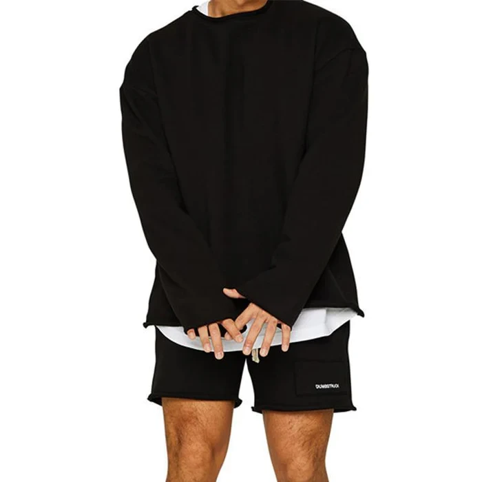Conjunto de sudadera y pantalones cortos sueltos de color liso a la moda para hombre