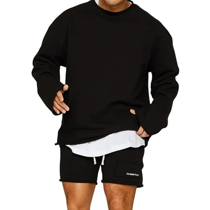 Conjunto de sudadera y pantalones cortos sueltos de color liso a la moda para hombre