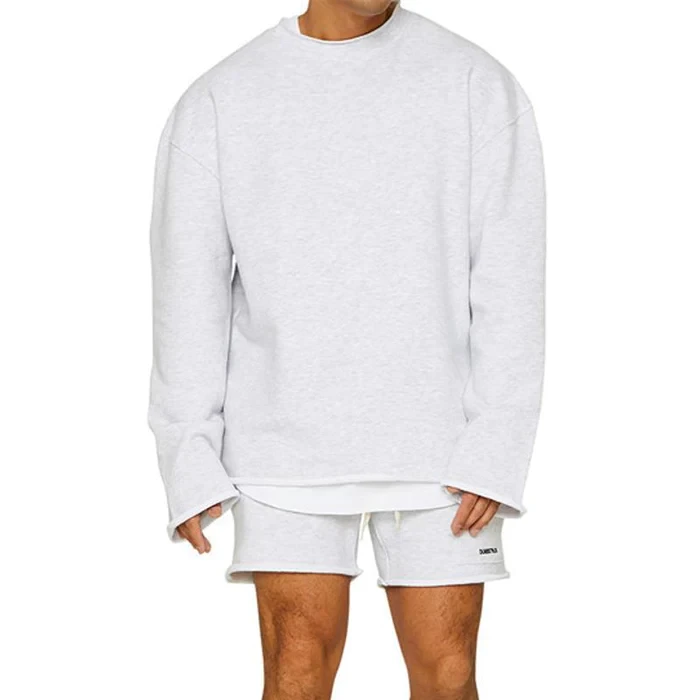 Conjunto de sudadera y pantalones cortos sueltos de color liso a la moda para hombre