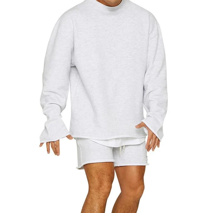 Conjunto de sudadera y pantalones cortos sueltos de color liso a la moda para hombre