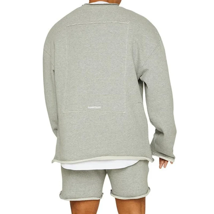 Conjunto de sudadera y pantalones cortos sueltos de color liso a la moda para hombre