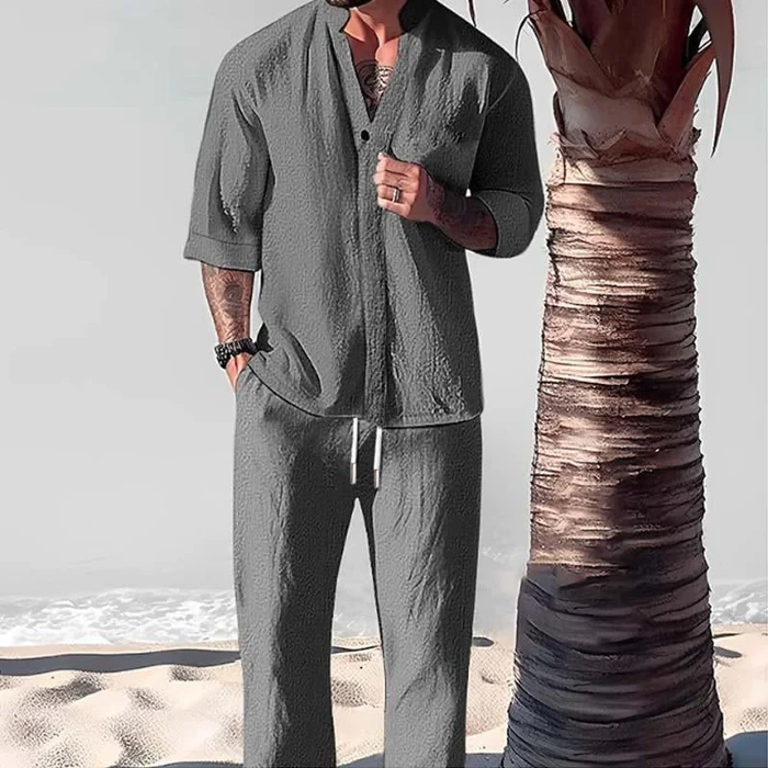 Conjunto de camisa y pantalón de media manga de color liso, informal y holgado para hombre