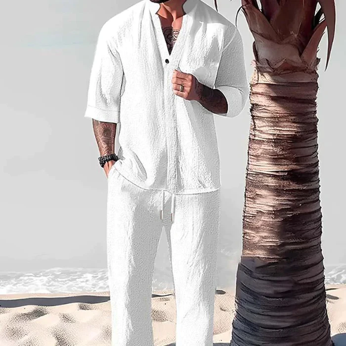 Conjunto de camisa y pantalón de media manga de color liso, informal y holgado para hombre