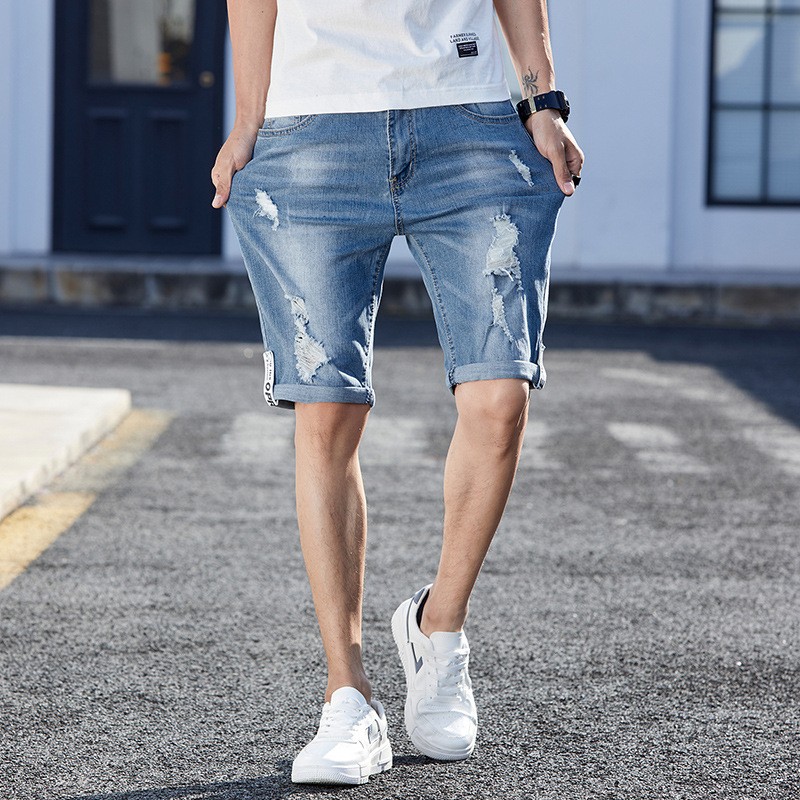 Pantalones cortos vaqueros holgados con agujeros para hombre
