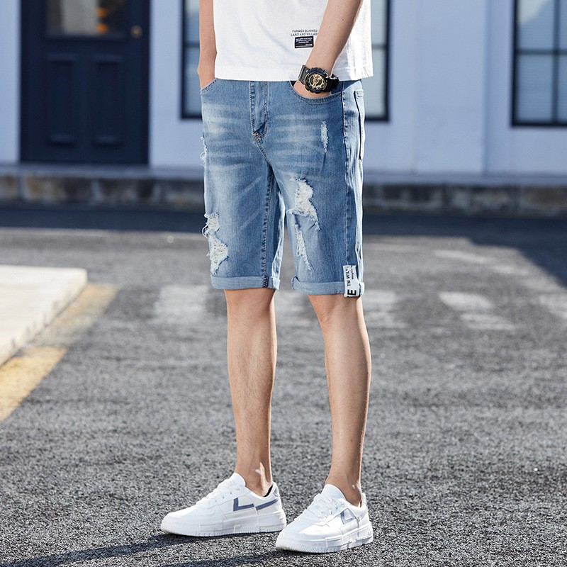 Pantalones cortos vaqueros holgados con agujeros para hombre