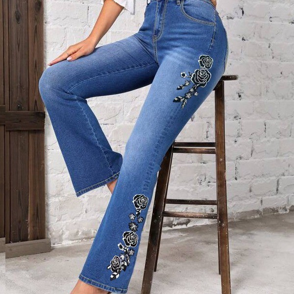 Vaqueros acampanados elásticos con bordado floral para mujer