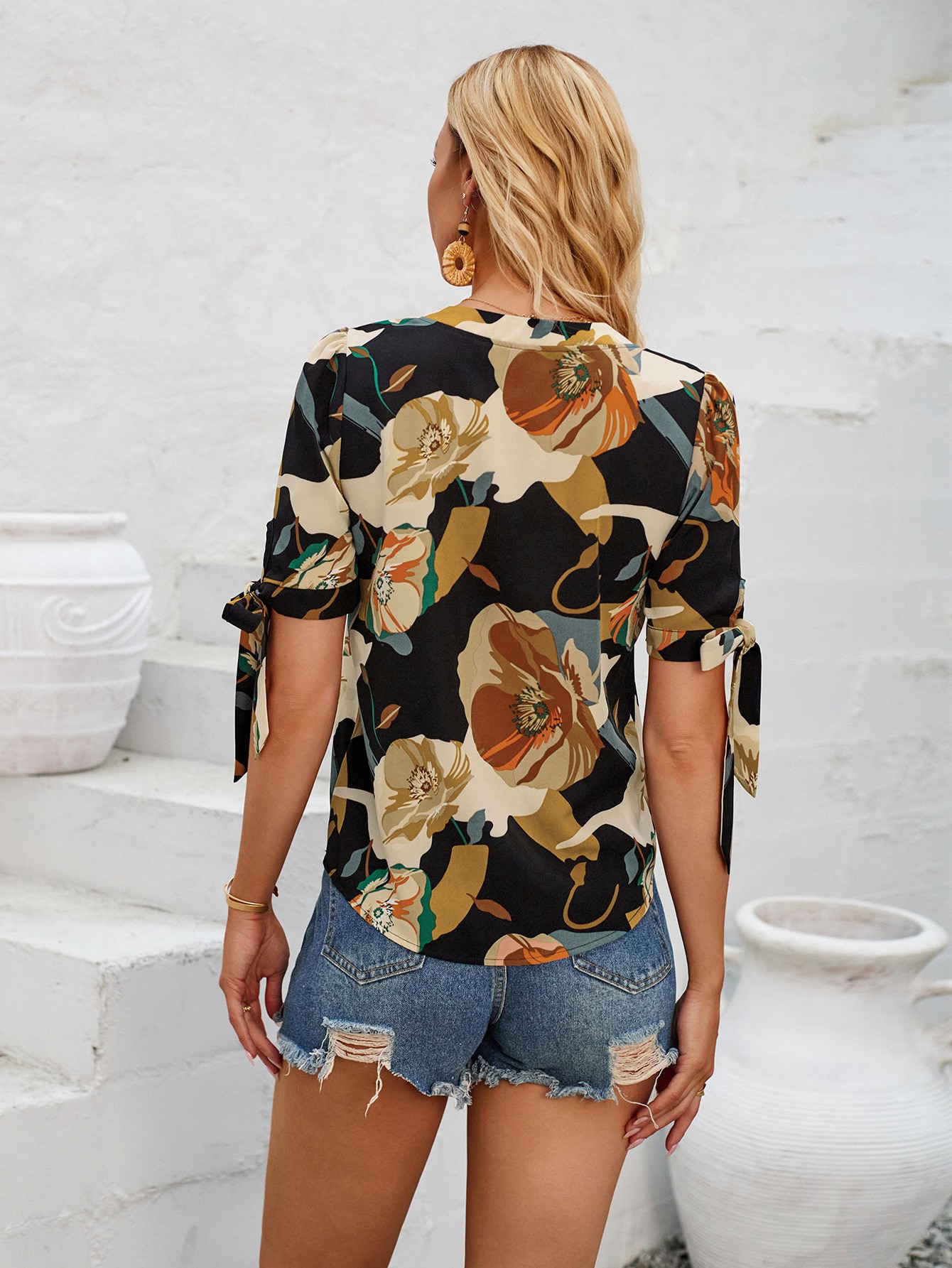 Top informal con cuello en V y puños estampados de moda
