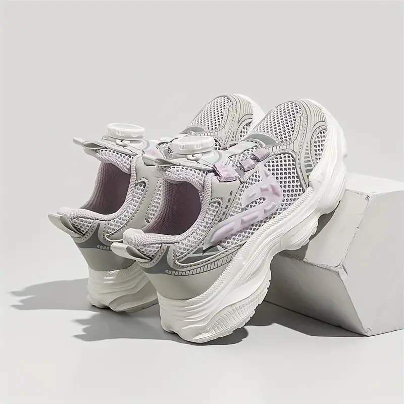 Zapatillas de baloncesto de malla de caña baja y modernas