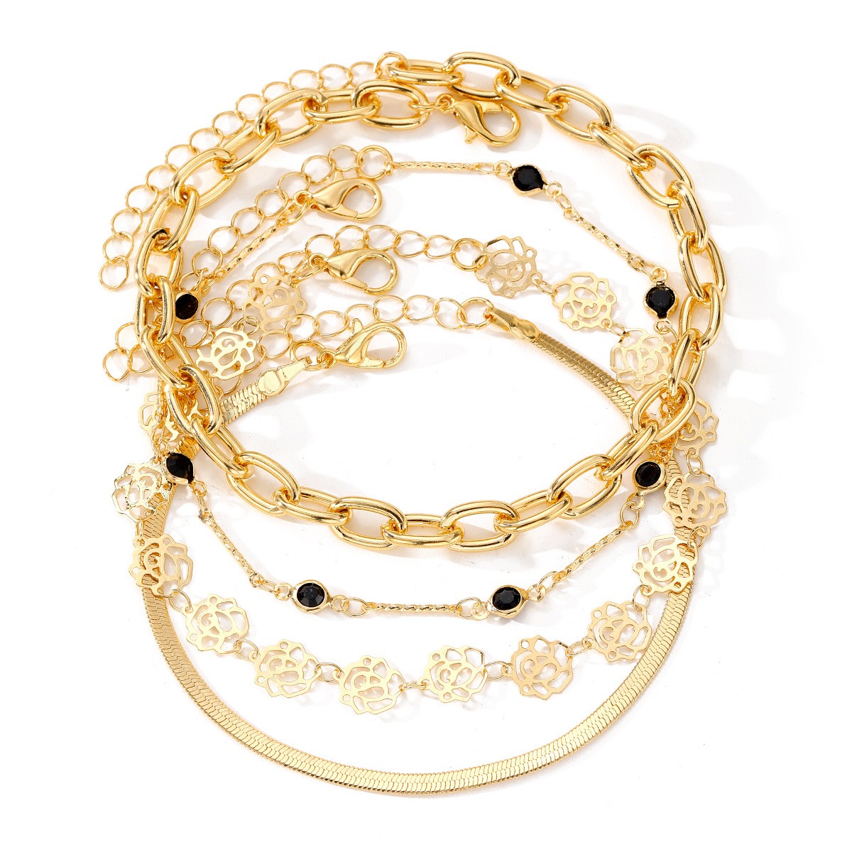 Conjunto de 4 tobilleras con diamantes negros y rosas