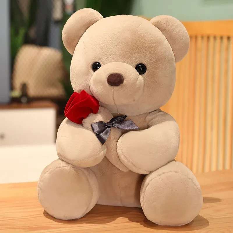 Preciosa almohada de peluche de osito de peluche con rosas de abrazo