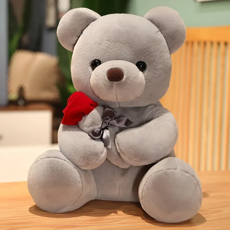 Preciosa almohada de peluche de osito de peluche con rosas de abrazo