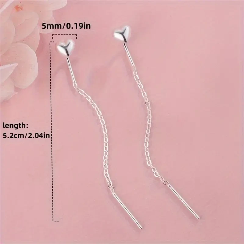 Adorables pendientes colgantes de corazón de plata de ley