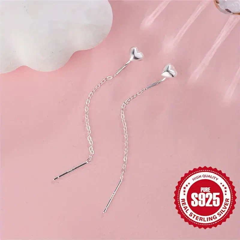 Adorables pendientes colgantes de corazón de plata de ley