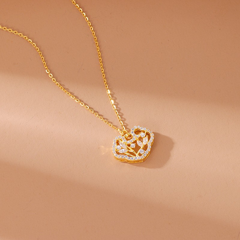 Collar de diamantes de lujo con luz de viento rojo neto