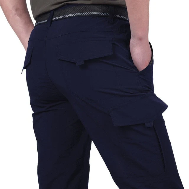 Pantalones cargo holgados con cintura elástica y múltiples bolsillos para hombre