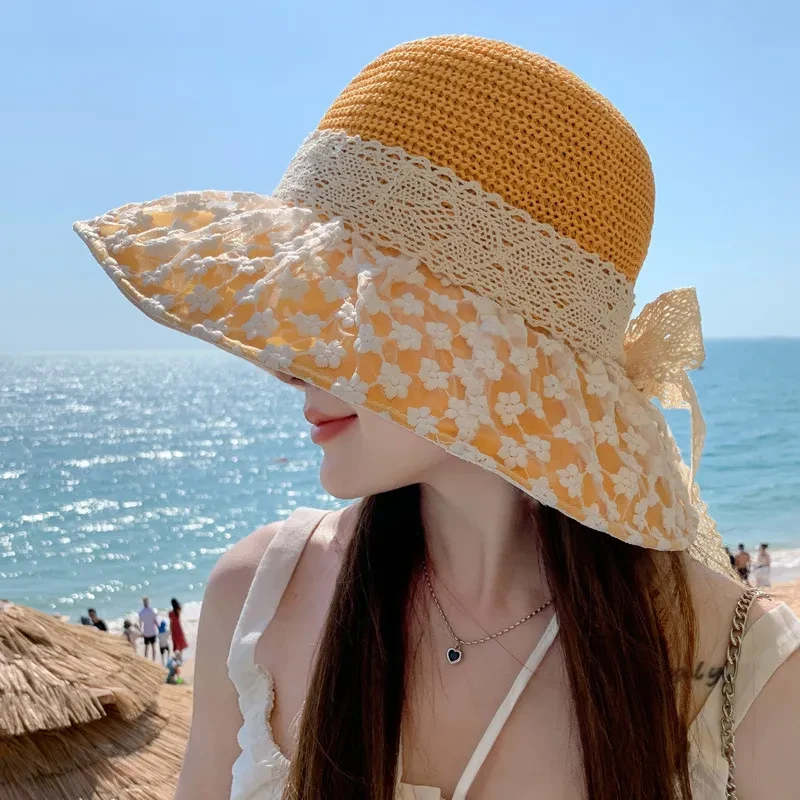 Sombrero de paja con lazo de encaje