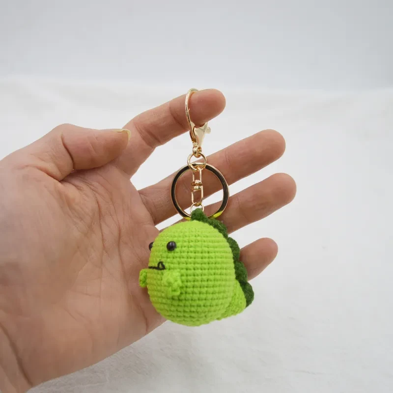 Lindo mini dinosaurio llavero colgante hecho a mano