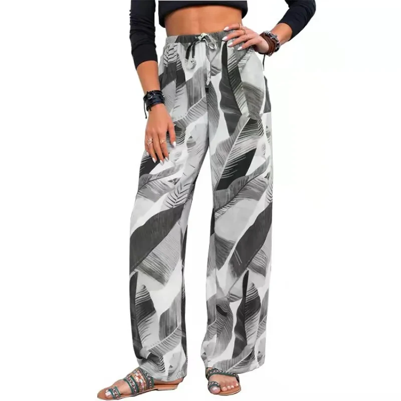 Pantalones de playa con cordón y estampado de hojas