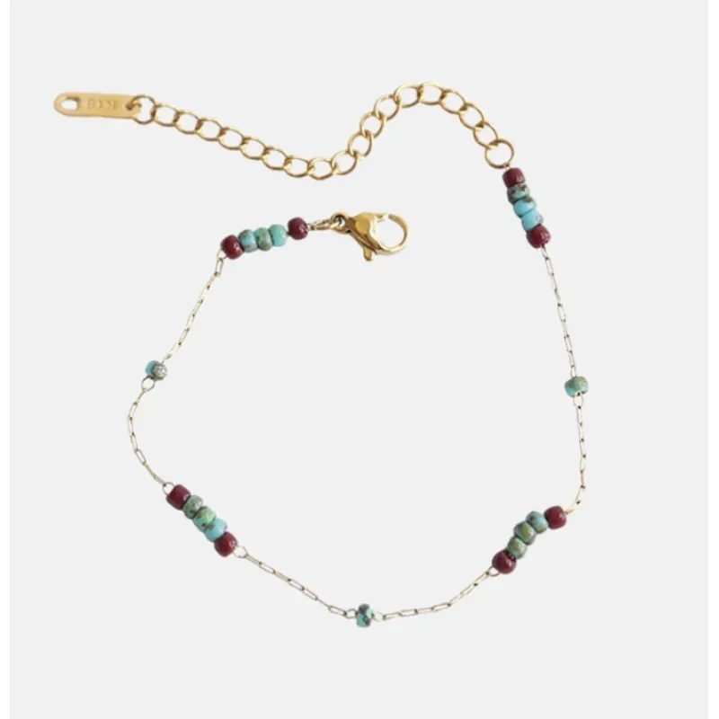 Elegante collar de cuentas turquesa y rojo vino