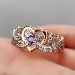 Anillo de compromiso con diseño de corazón radiante y rosa