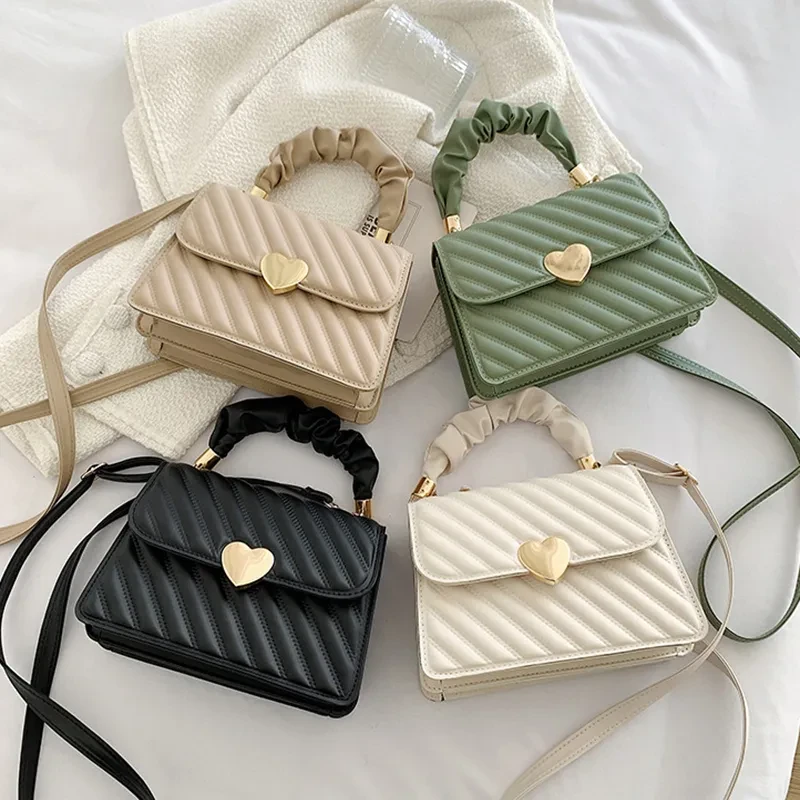 Bolso bandolera de cadena para mujer con diseño de metal con forma de corazón
