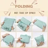 Mochila plegable impermeable con cordón de gran capacidad bordada