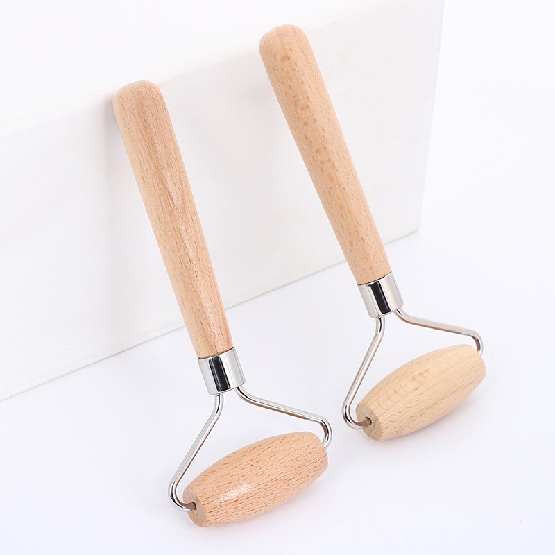Masajeador facial Gua Sha - Rodillo de madera con masaje de espinas y mango de madera