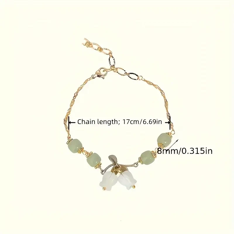 Pulsera de cuentas verdes con dije de lirio de los valles