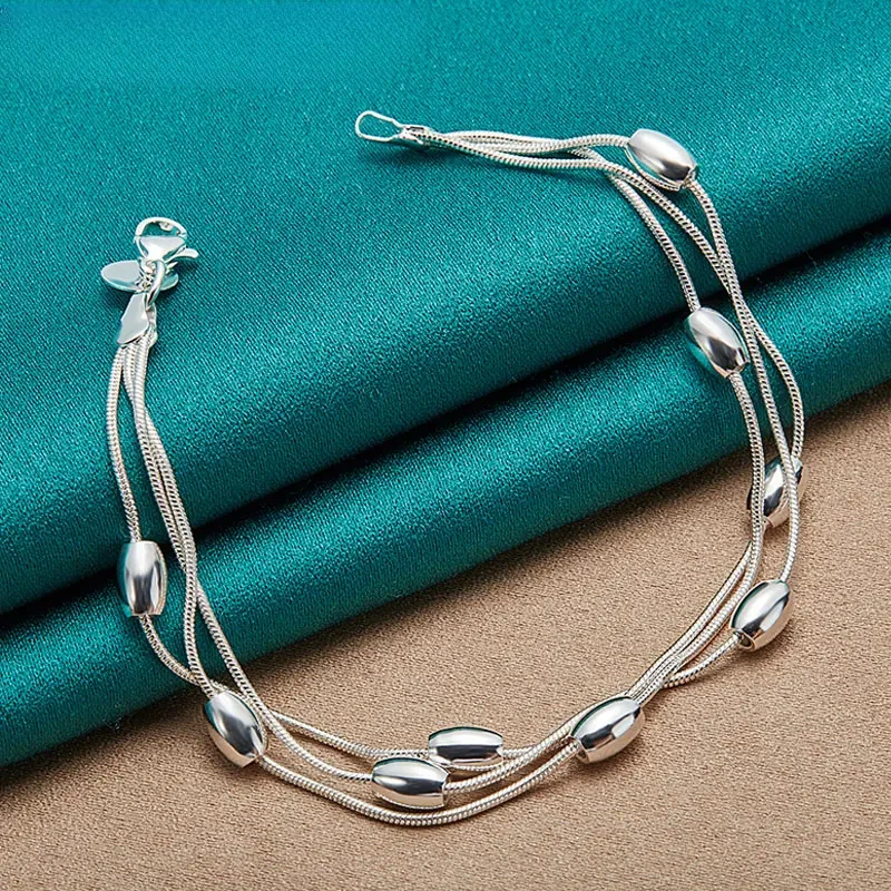 Pulsera de cuentas de plata de tres hilos