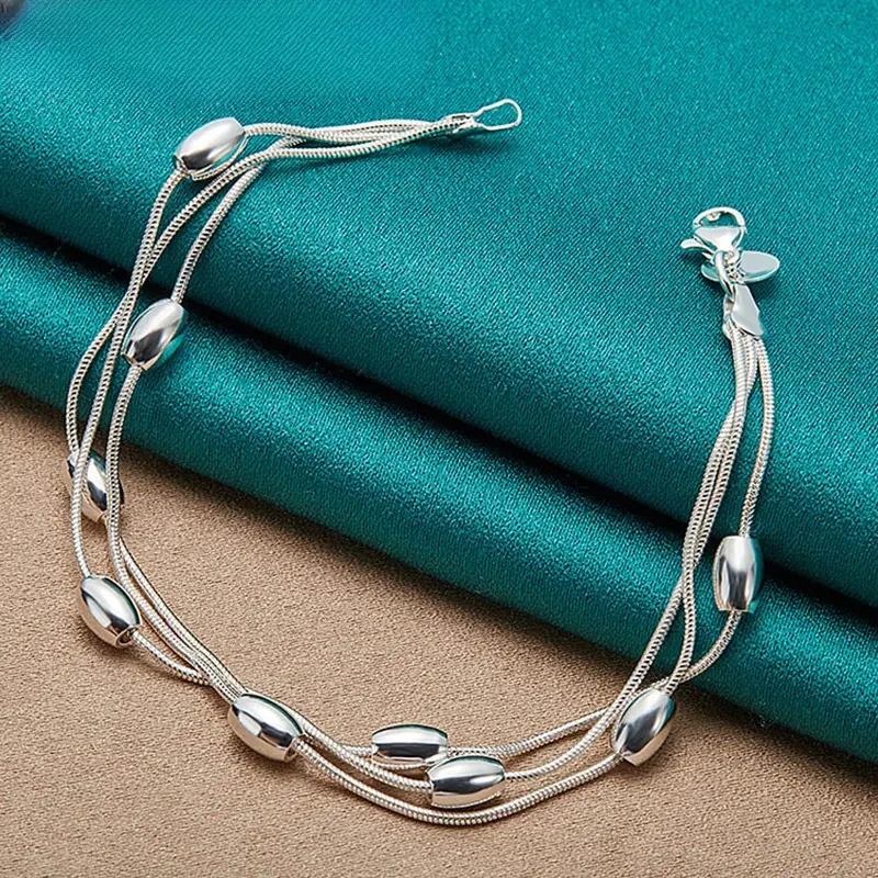 Pulsera de cuentas de plata de tres hilos