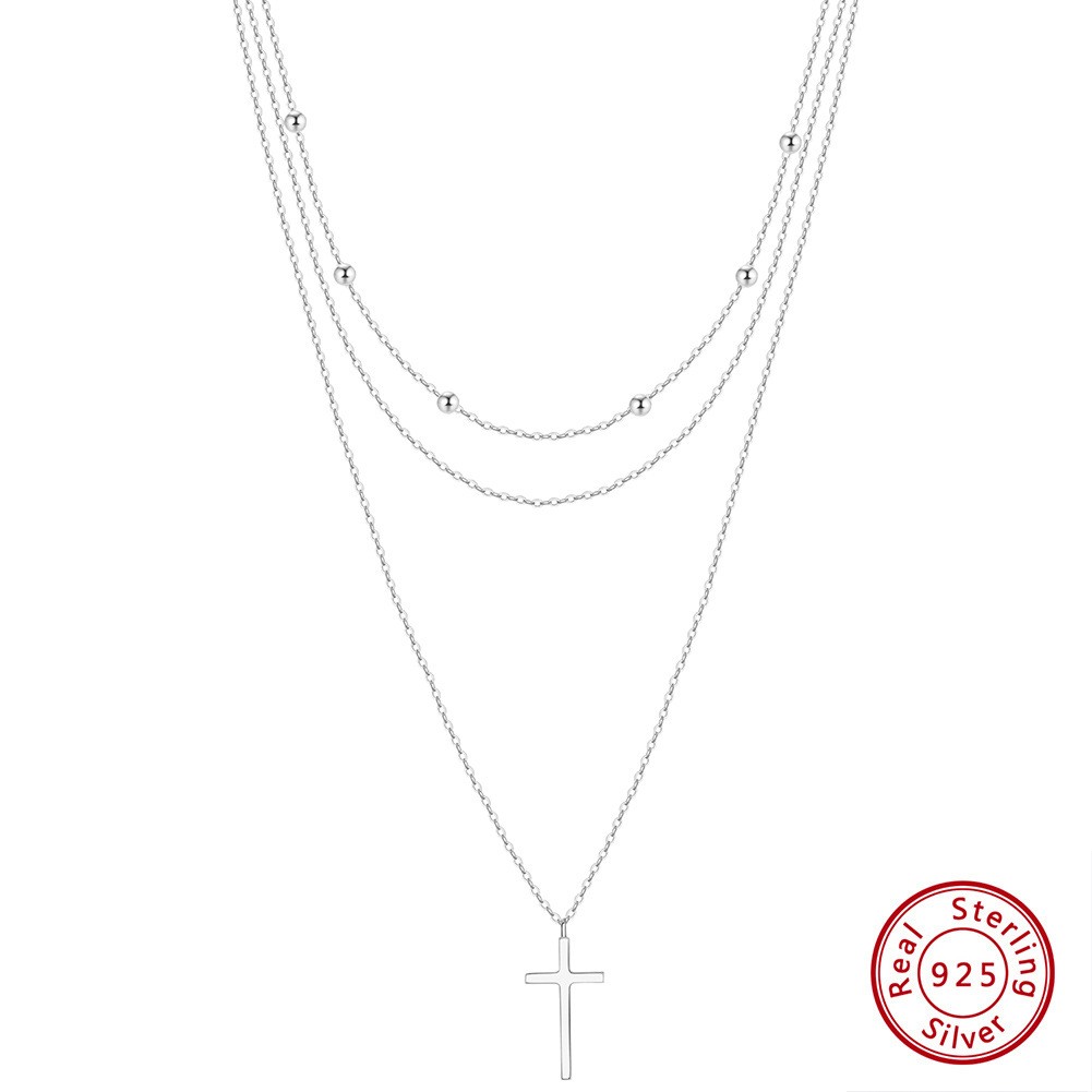 Collar con colgante de cruz de plata de ley