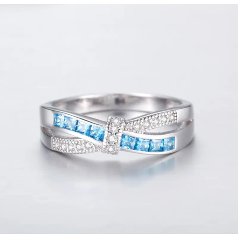 Anillo de piedras preciosas radiantes de infinito