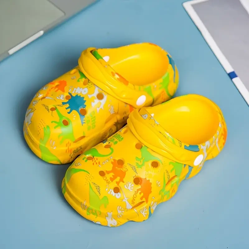 Zuecos unisex con adorable estampado de dinosaurio para niños, cómodos, antideslizantes, informales, de suela suave, transpirables y calados, ideales para actividades al aire libre.