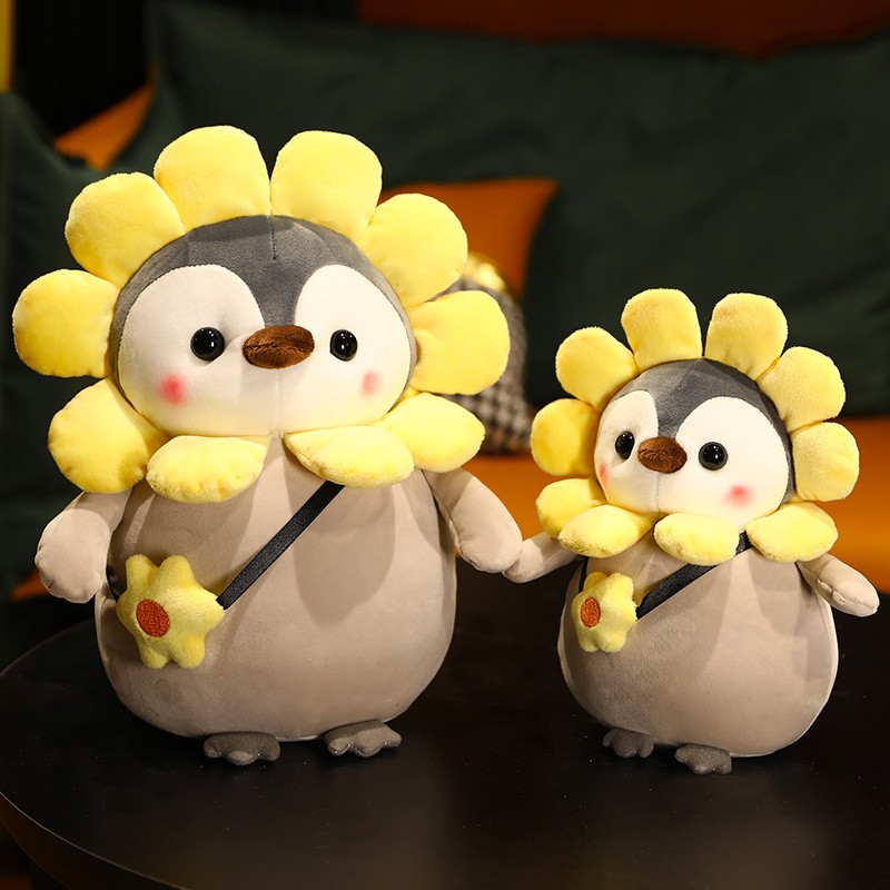 Peluche de pingüino kawaii de 25 cm: un encantador pingüino que se convierte en muñeco de dinosaurio girasol.