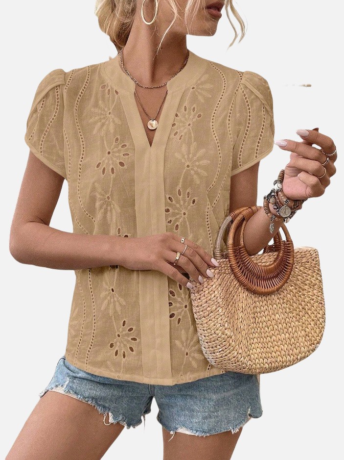 Top bordado hueco de color liso para mujer