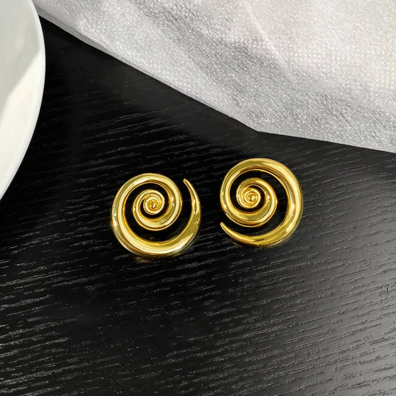 Pendientes de oro de 18 quilates con rotación geométrica