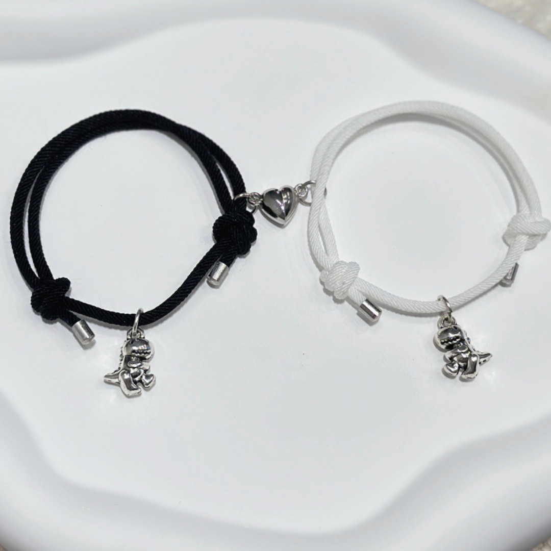 Pulsera creativa con colgante de dinosaurio 3D pequeño y bonito con cierre magnético y ventosa para pareja