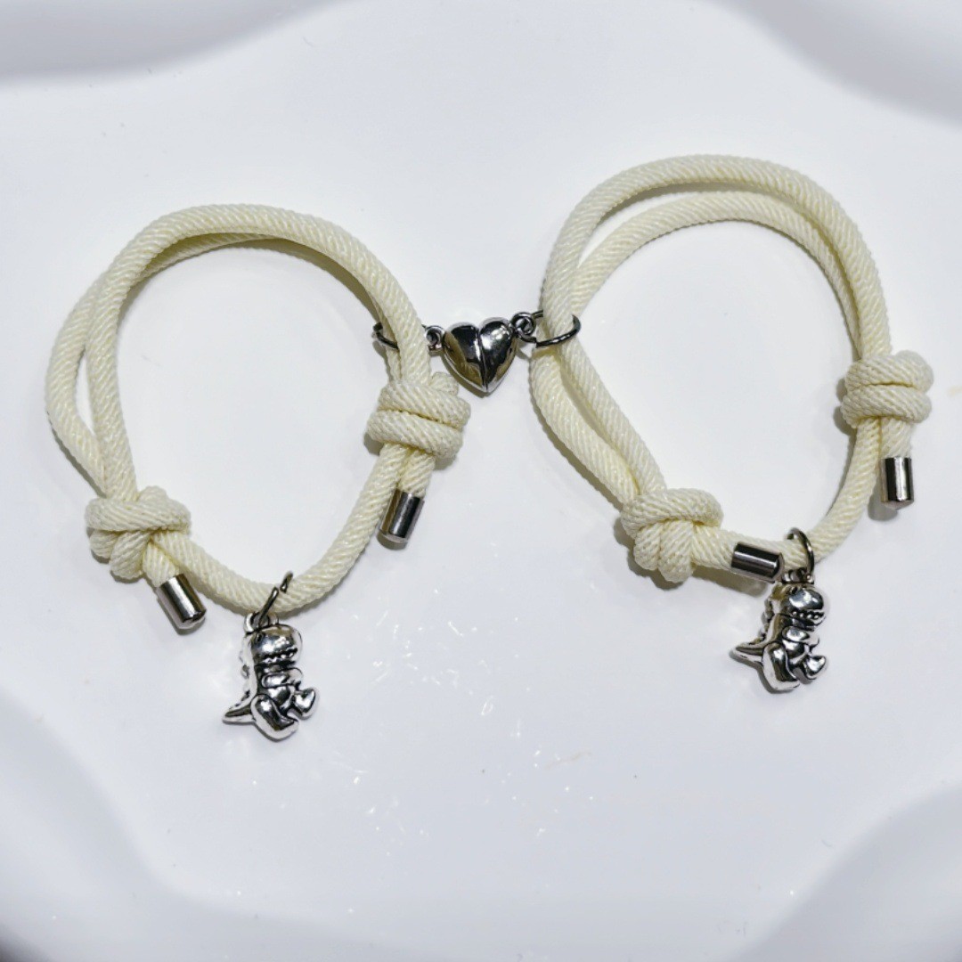 Pulsera creativa con colgante de dinosaurio 3D pequeño y bonito con cierre magnético y ventosa para pareja