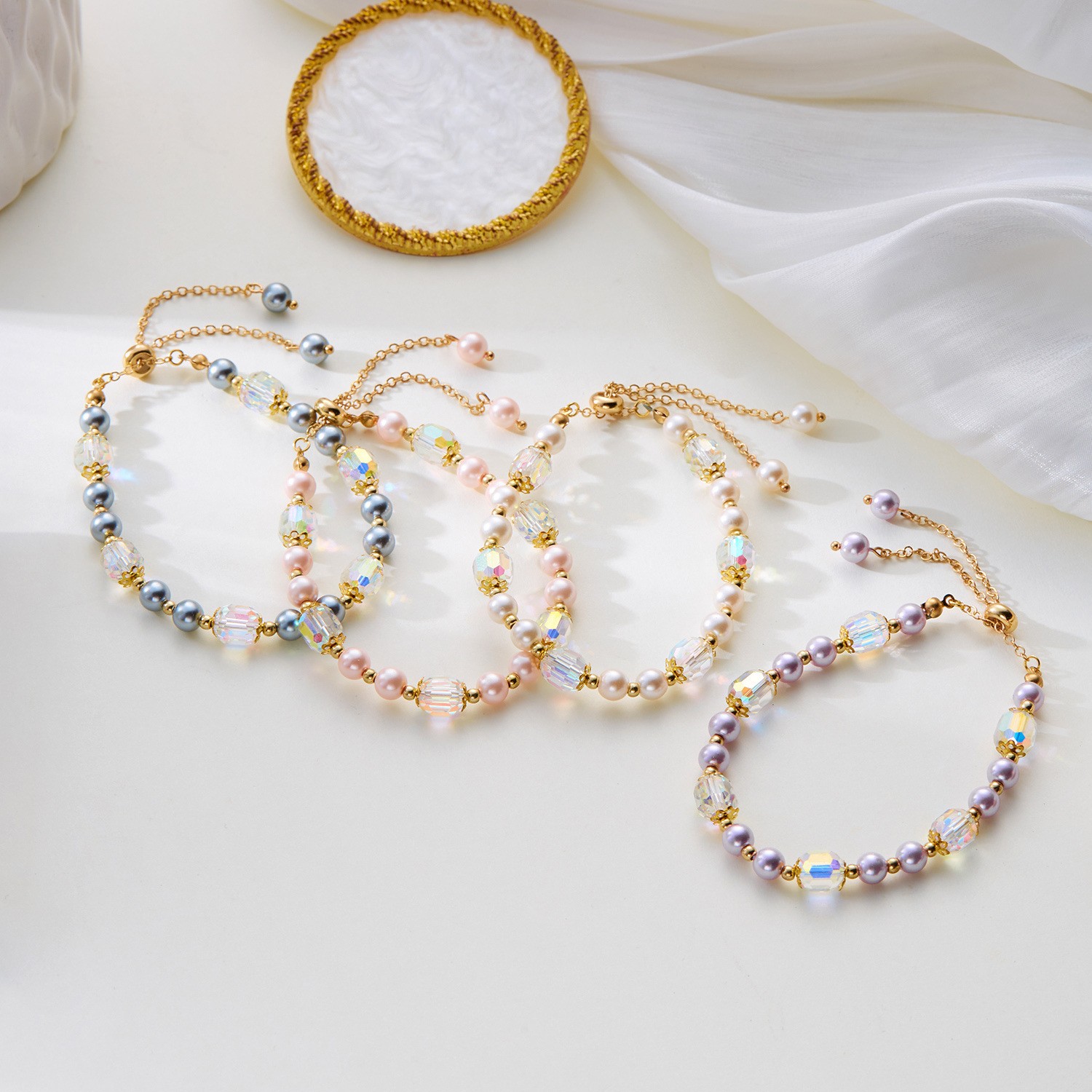 Elegante pulsera de perlas pastel y cuentas de cristal
