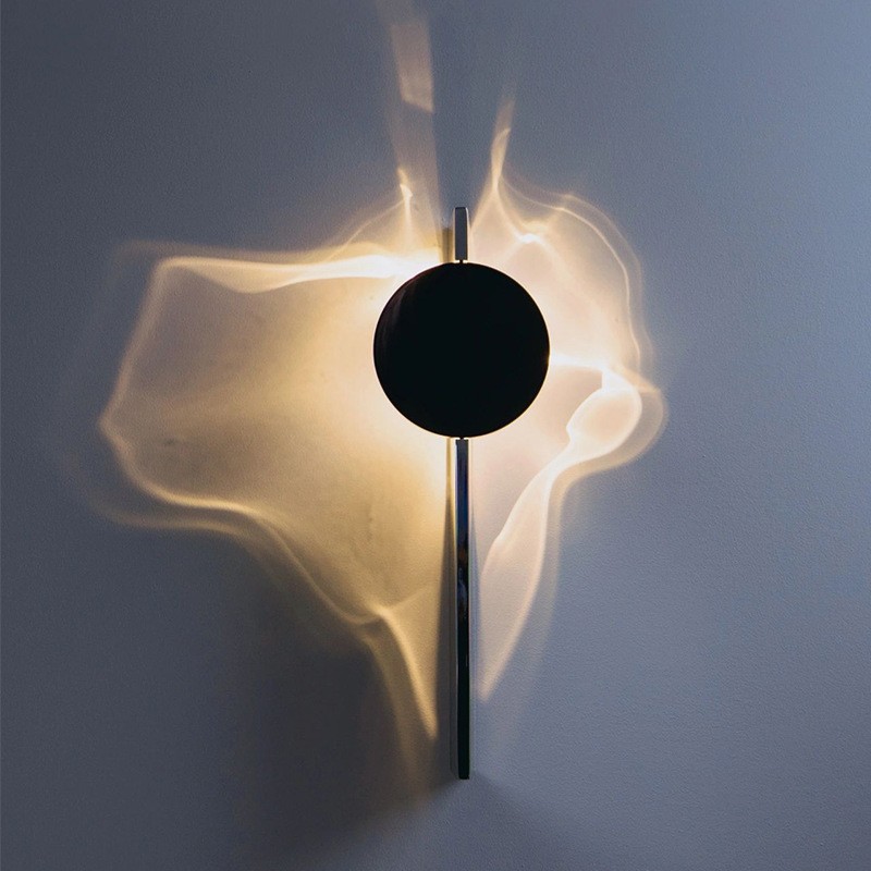 Lámpara de pared cromada creativa: aplique LED giratorio de acero inoxidable para sala de estar, fondo de TV y decoración de pasillos.