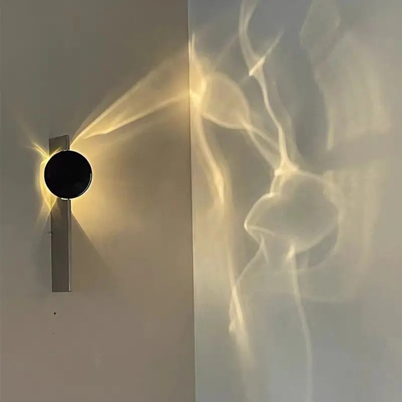 Lámpara de pared cromada creativa: aplique LED giratorio de acero inoxidable para sala de estar, fondo de TV y decoración de pasillos.