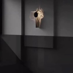 Lámpara de pared cromada creativa: aplique LED giratorio de acero inoxidable para sala de estar, fondo de TV y decoración de pasillos.