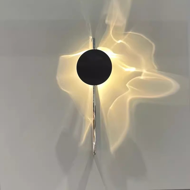 Lámpara de pared cromada creativa: aplique LED giratorio de acero inoxidable para sala de estar, fondo de TV y decoración de pasillos.